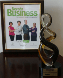 Dara Security award in front of Nevada Business magazine cover